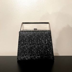 Black and silver boxed like handbag